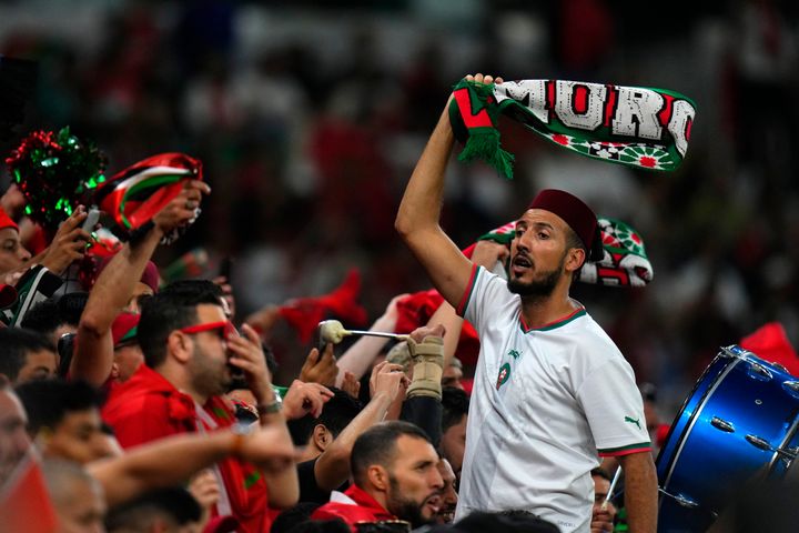 Morocco fans cheer during the World Cup quarterfinal soccer match between Morocco and Portugal, at Al Thumama Stadium in Doha, Qatar, Saturday, Dec. 10, 2022. (AP Photo/Petr David Josek)