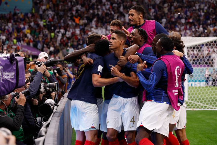 Dec 10, 2022; Al Khor, Qatar; France forward Olivier Giroud (9) celebrates with teammates after scoring during the second half of a quarterfinal game against England in the 2022 FIFA World Cup at Al-Bayt Stadium. Mandatory Credit: Yukihito Taguchi-USA TODAY Sports