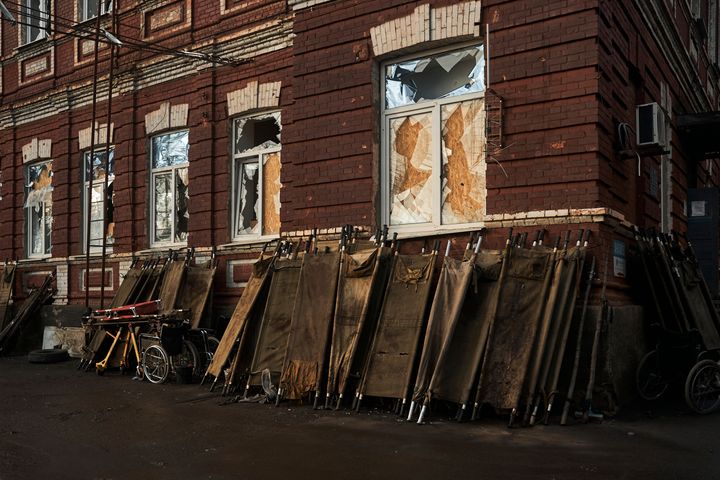Stretchers are seen Dec. 9 outside a Bakhmut hospital where wounded Ukrainian soldiers are brought for treatment.