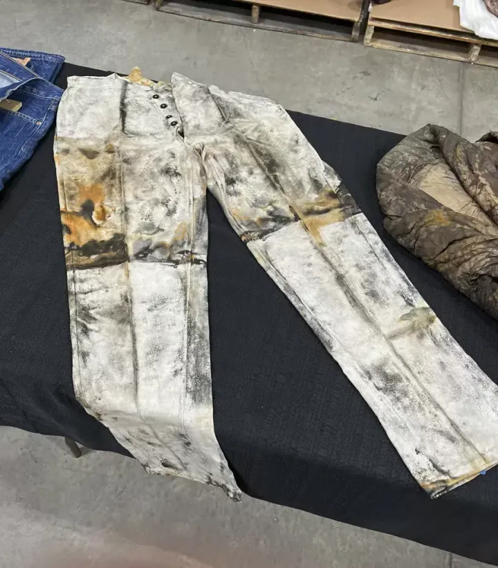 In this undated photo provided by Holabird Western Americana Collections are miner's work pants with a five-button fly, recovered from the 1857 sinking of the S.S. Central America, that may have been made by or for Levi Strauss during the California Gold Rush-era. 