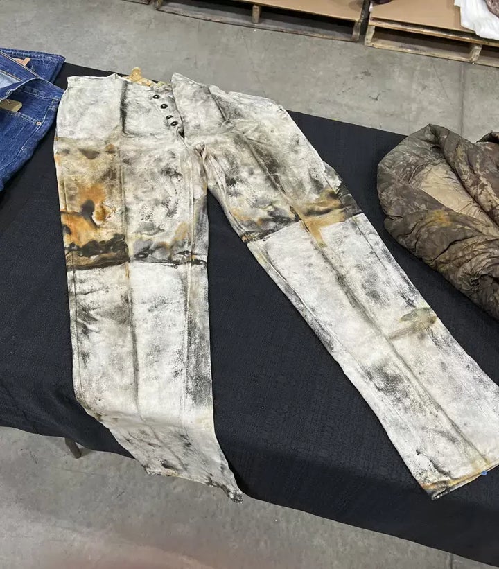 In this undated photo provided by Holabird Western Americana Collections are miner's work pants with a five-button fly, recovered from the 1857 sinking of the S.S. Central America, that may have been made by or for Levi Strauss during the California Gold Rush-era.