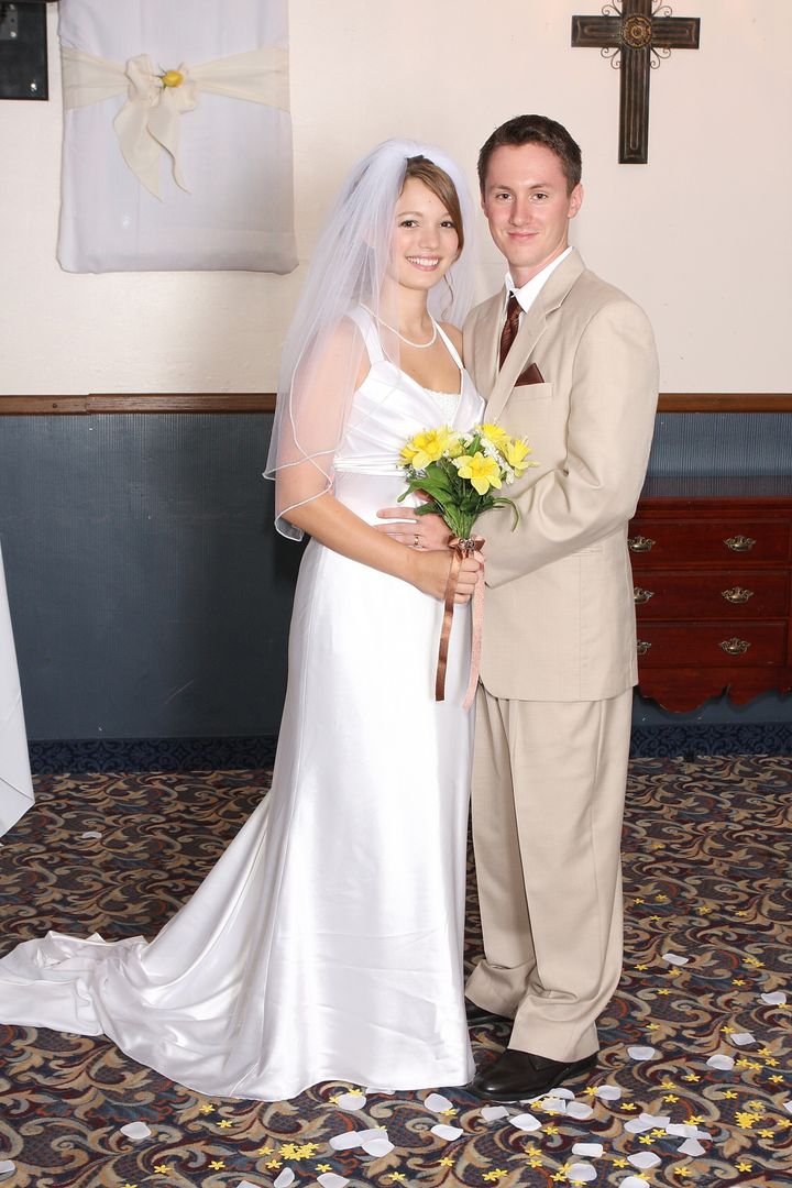 The author and her husband at their wedding in Arkansas in July 2009. “We were both 19 years old and the suit my husband rented was too big for him,” she writes.