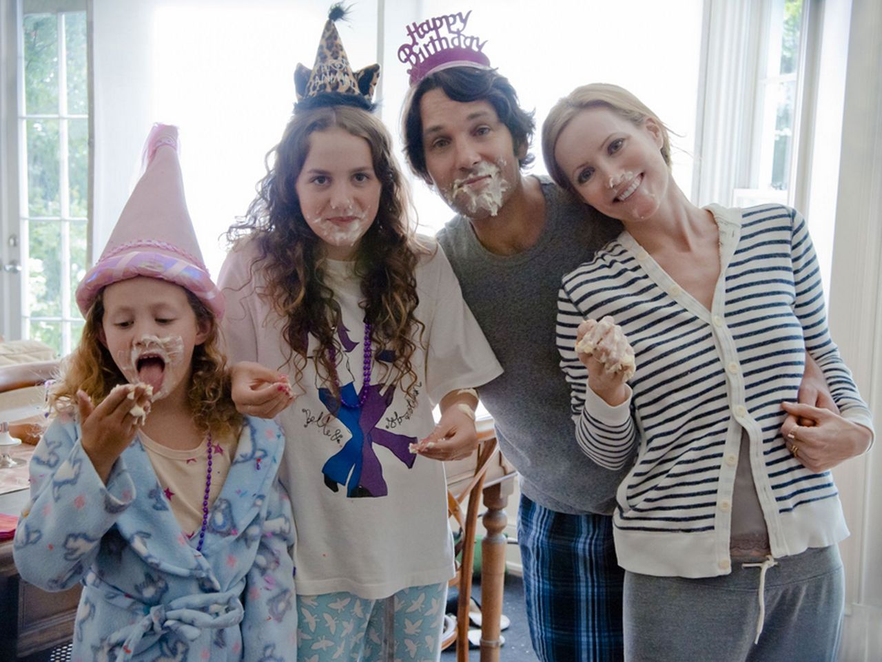 From left: Iris Apatow, Maude Apatow, Rudd and Mann in a promotional photo for "This Is 40."