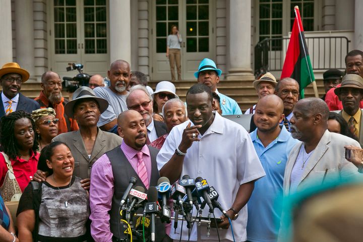 Raymond Santana, second from left front, Yusef Salaam, center, and Kevin Richardson, second from right front, are three of the five men exonerated in the Central Park jogger rape case. They're seen at a 2014 news conference.