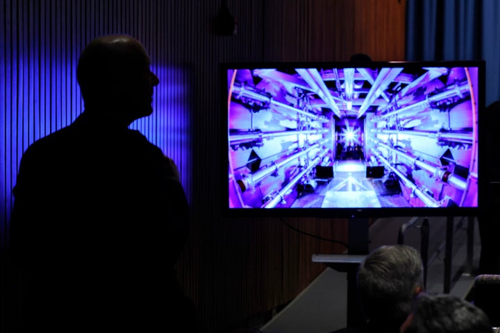 Guests await the beginning of a news conference with U.S. Energy Secretary Jennifer Granholm at the Department of Energy headquarters to announce a breakthrough in fusion research on Dec. 13 in Washington, D.C.