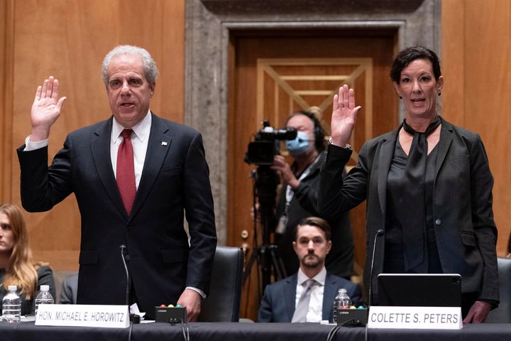 Inspector General U.S. Department of Justice Michael E. Horowitz, left and Director Federal Bureau of Prisons Colette S. Peters are sworn during the hearing of Senate Homeland Security and Governmental Affairs Subcommittee on Investigations, on Sexual Abuse of Female Inmates in Federal Prisons, on Capitol Hill in Washington, on Dec. 13, 2022. 