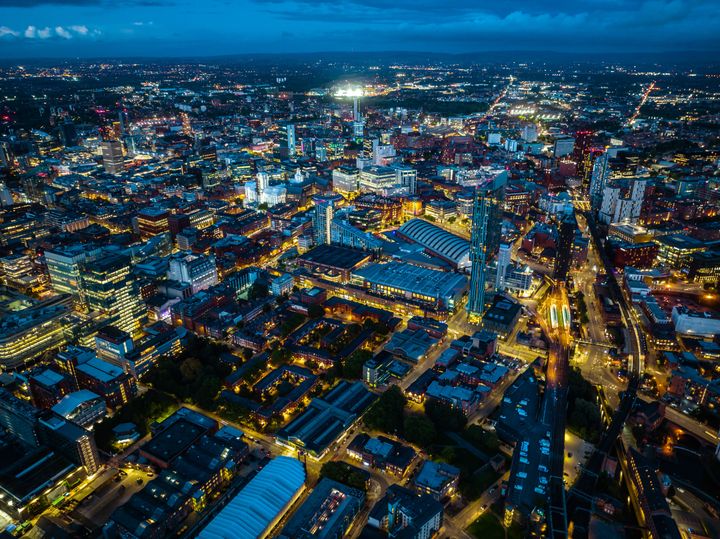 Aerial view of Manchester city in UK at night