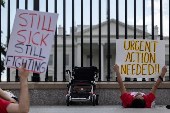 Protestors lay down outside the White House on Sept. 19, 2022 to call attention to those suffering from long-COVID.