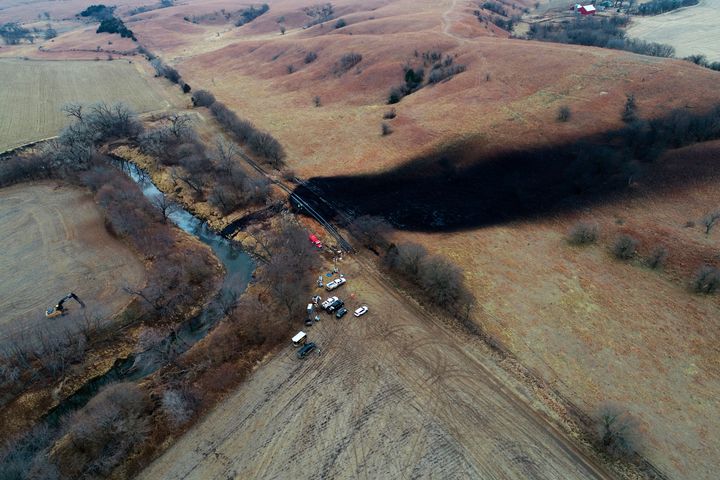 In this photo taken by a drone, cleanup continues in the area where the ruptured Keystone pipeline dumped oil into a creek in Washington County, Kansas, on Dec. 9, 2022.