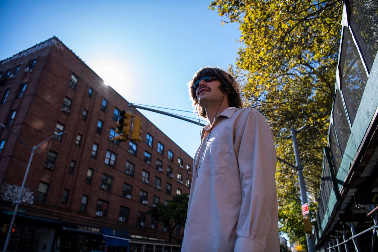 Bobby walks around the East Village. “I’ve tried to take the subway but it’s a little bit of a tight squeeze," he says.