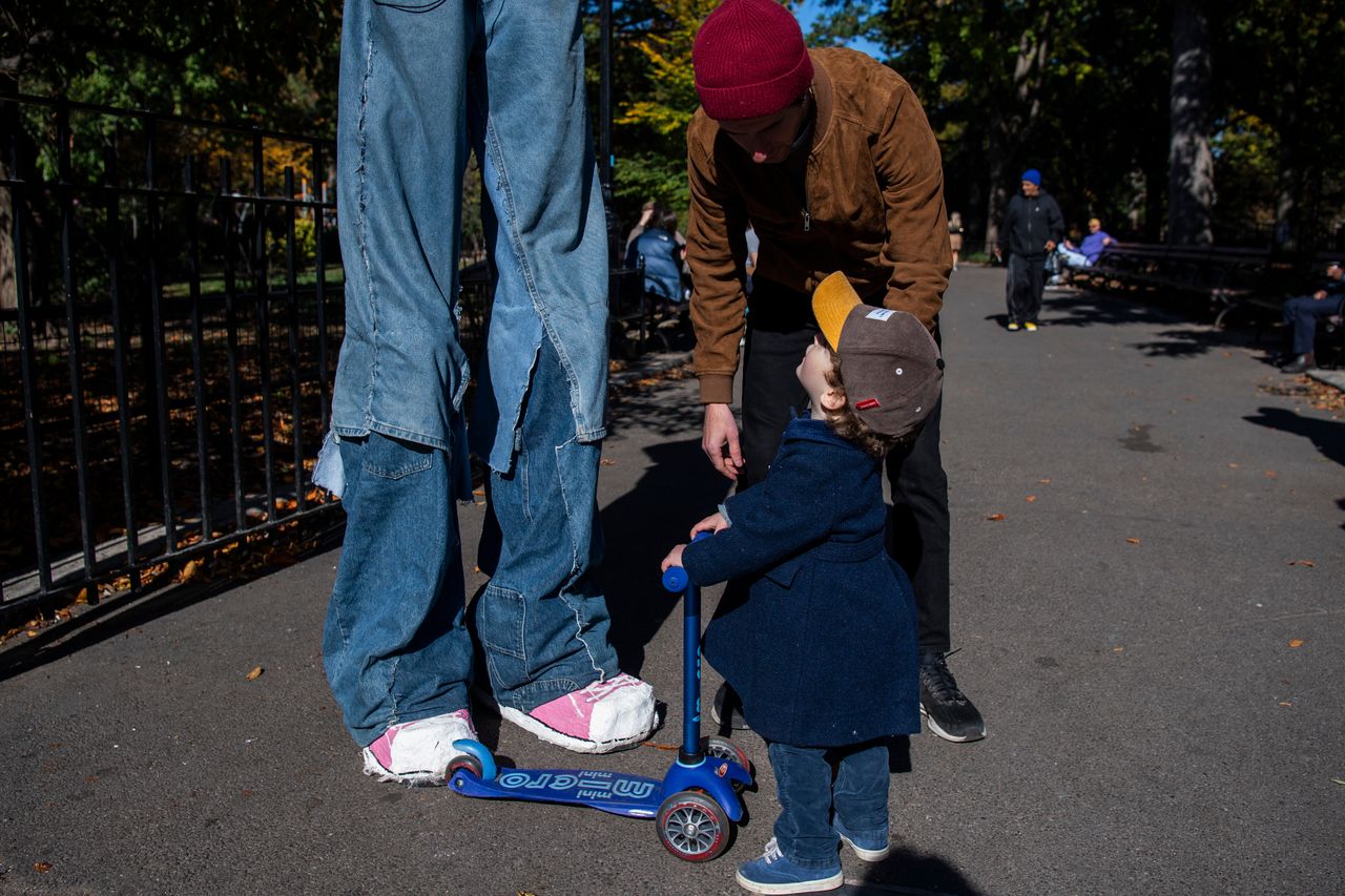 Alex, 3, looks up at Bobby at Tompkins Square Park in the East Village.