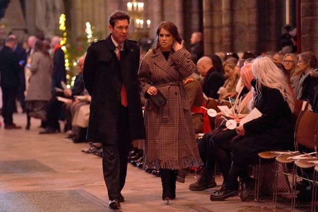 Princess Eugenie of York and her husband, Jack Brooksbank, arrive to attend the Together at Christmas carol service.