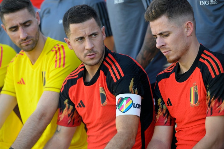 Hazard Eden, a midfielder on the Belgian National Football team, wears the OneLove armband during a team photo session on Nov. 25, 2022.