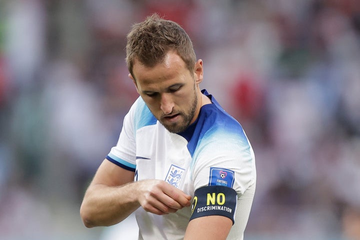 Harry Kane of England's national football team wears a "No Discrimination" armband during the World Cup match between England v Iran, after FIFA forbade players from wearing a "OneLove" armband in support of LGBTQ rights.