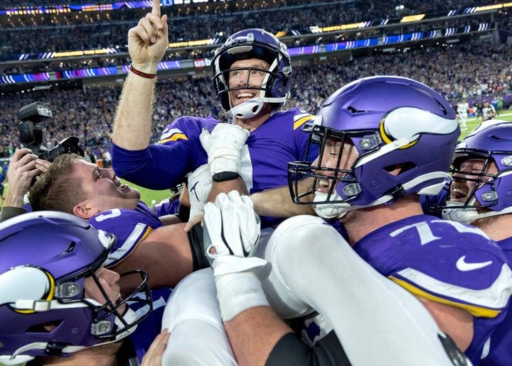 Minnesota Vikings kicker Greg Joseph celebrates with teammates after kicking the game-winning field goal in overtime against the Indianapolis Colts in an NFL football game, Saturday, Dec.  17, 2022, in Minneapolis, Minn.  (Carlos Gonzalez/Star Tribune via AP)