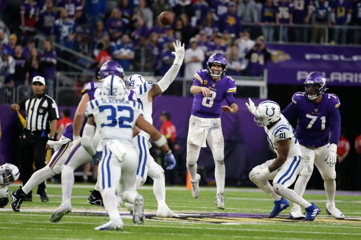 Minnesota Vikings quarterback Kirk Cousins ​​(8) throws a pass during overtime in an NFL football game against the Indianapolis Colts Saturday, December 17, 2022 in Minneapolis.  The Vikings won 39-36.  (AP Photo/Andy Clayton-King)
