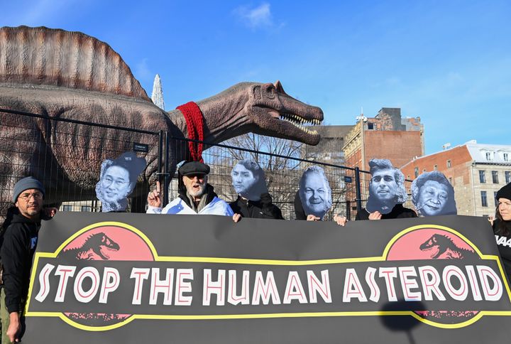 IMAGE DISTRIBUTED FOR AVAAZ - Actor and activist James Cromwell, third left, called on world leaders to "Stop the Human Asteroid" in the talks at COP15 in Montreal, Quebec, Canada, Thursday, Dec. 15, 2022. Avaaz activists joined him wearing the faces of leaders who are pushing to remove Indigenous people's language from the text of the Post-2020 Global Biodiversity Framework. (Graham Hughes/AP Images for Avaaz)