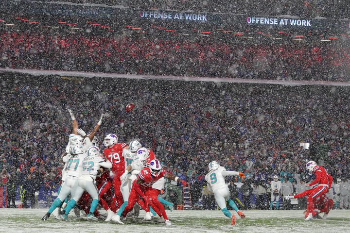 Buffalo Bills place kicker Tyler Bass (2) kicks a game-winning field goal during the second half of an NFL football game against the Miami Dolphins in Orchard Park, New York on Saturday. The Bills won 32-29.