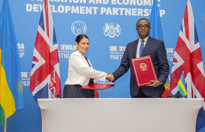 Priti Patel and Rwandan Foreign Minister Vincent Biruta sign the agreement in April.