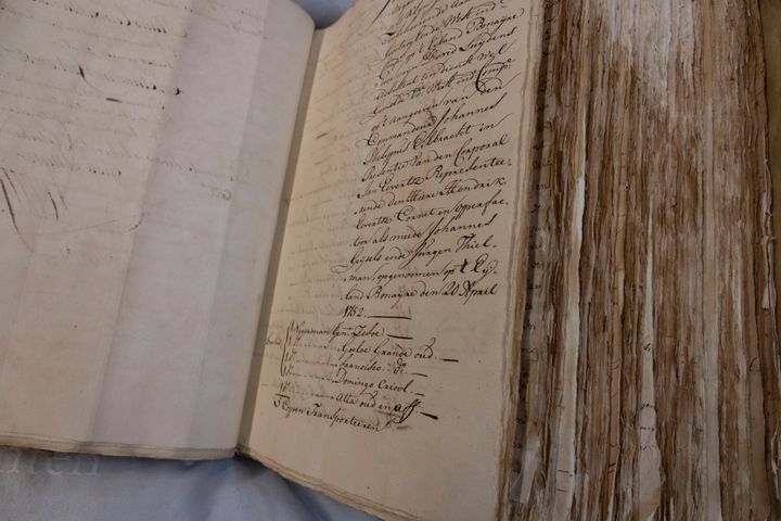 A ledger containing the names of enslaved people is shown at the National Archives in The Hague, Netherlands, on Dec. 19, 2022. The Dutch government is expected to issue a long-awaited formal apology for its role in the slave trade, with a speech by Dutch Prime Minister Mark Rutte, and ceremonies in the former colonies. 