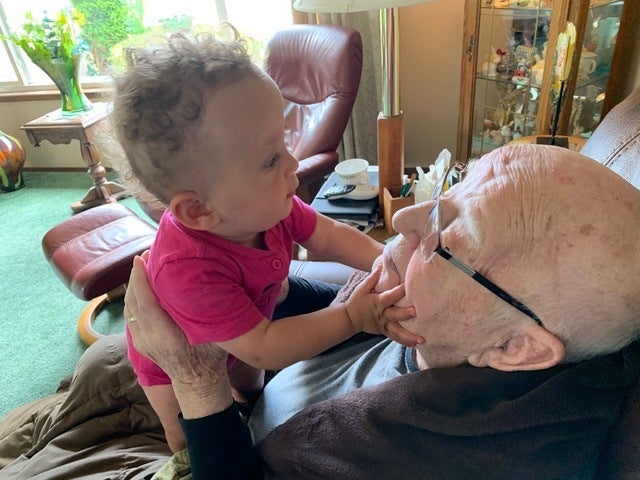 The author's dad and son in 2018. "It was love at first sight," he writes.