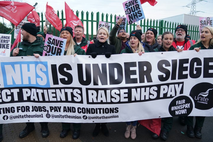 Unite union general secretary Sharon Graham (centre), joins ambulance workers on the picket line outside ambulance headquarters in Coventry, as paramedics, ambulance technicians and call handlers walk out in England and Wales, Wednesday December 21, 2022. (Photo by Jacob King/PA Images via Getty Images)