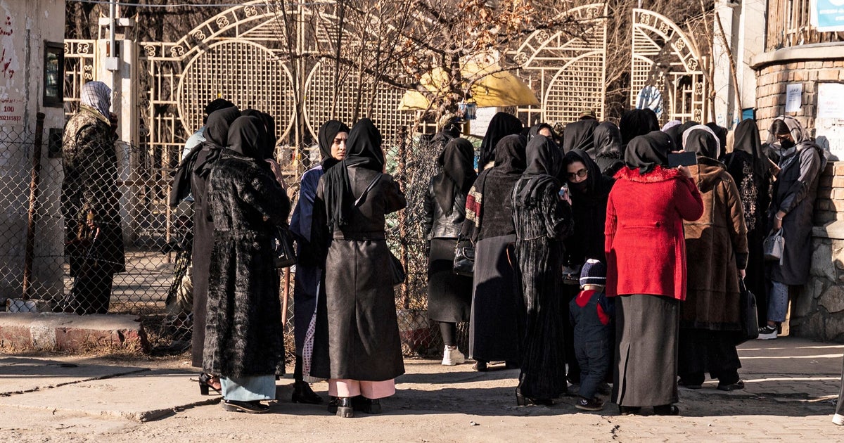 Afghan Women Weep As Taliban Fighters Enforce University Ban | HuffPost ...