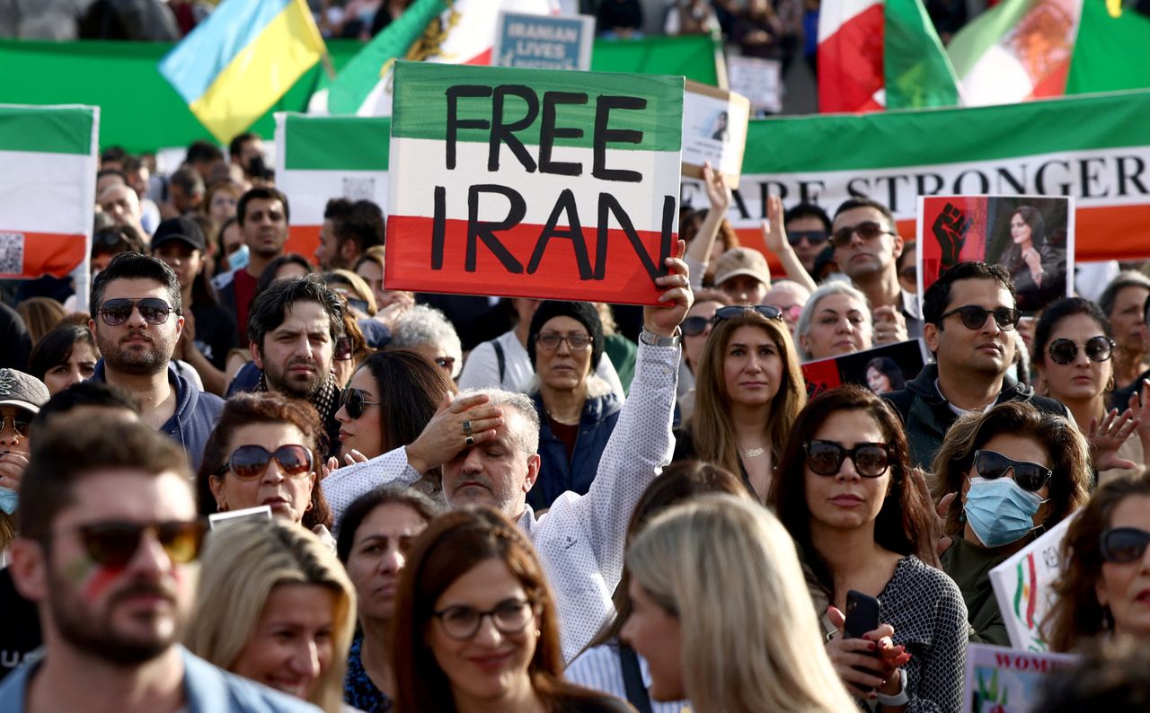 People protest in London on Oct. 29, following the death of Iranian Mahsa Amini.