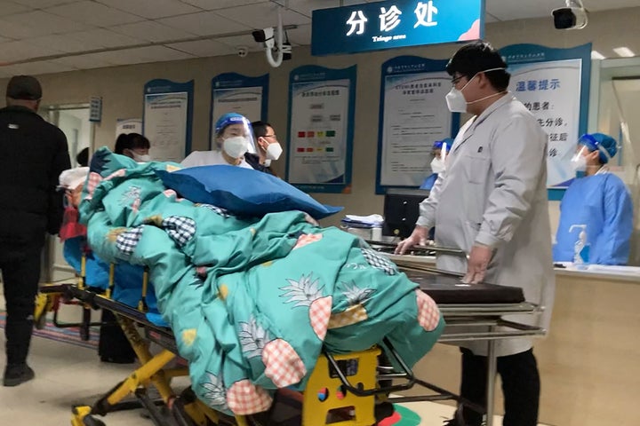 A patient is turned away from the emergency room due to full capacity at the Baoding No. 2 Central Hospital in Zhuozhou city in northern China's Hebei province on Wednesday.