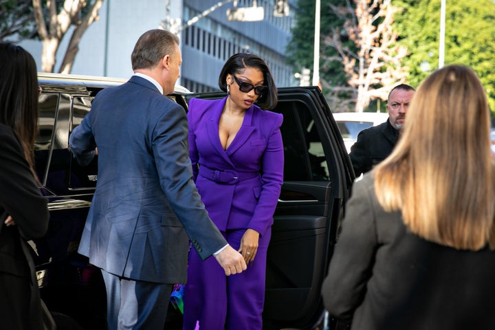 Megan Thee Stallion whose legal name is Megan Pete arrives at court to testify in the trial of rapper Tory Lanez on Tuesday in Los Angeles.