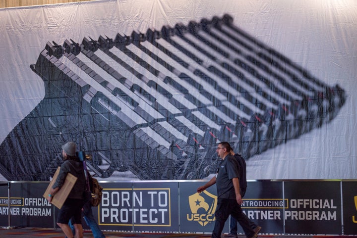 This photo taken Monday, Jan. 20, 2020, shows a sign advertising the U.S. Concealed Carry Association, which advocates on behalf of gun owners' rights to carry firearms concealed, on display at SHOT Show, the annual trade show for the gun industry in Las Vegas.