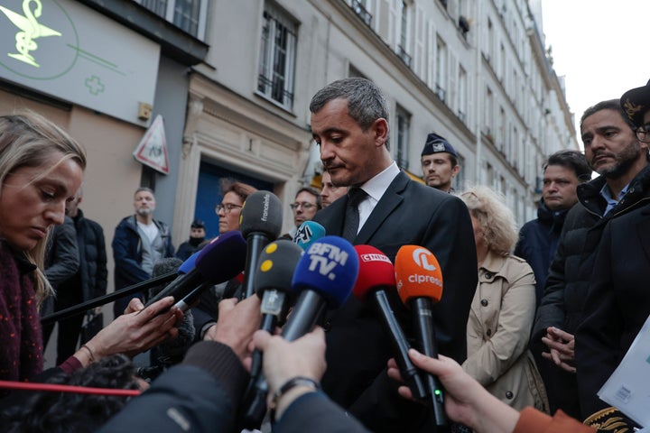 French Interior Minister Gerald Darmanin speaks at the scene to the media where a shooting took place in Paris, Friday, Dec. 23, 2022. aMultiple people have been wounded and one person arrested after a shooting in central Paris on Friday, authorities said. Police cordoned off the area in the 10th arrondissement of Paris and the Paris police department warned people to stay away from the area. It said one person was arrested, without providing details. (AP Photo/Lewis Joly)