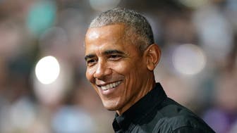 Former President Barack Obama speaks in support of Sen. Raphael Warnock, D-Ga., during a rally on Thursday, Dec. 1, 2022, in Atlanta. Warnock is running against Republican Herschel Walker in a runoff election. (AP Photo/Brynn Anderson)