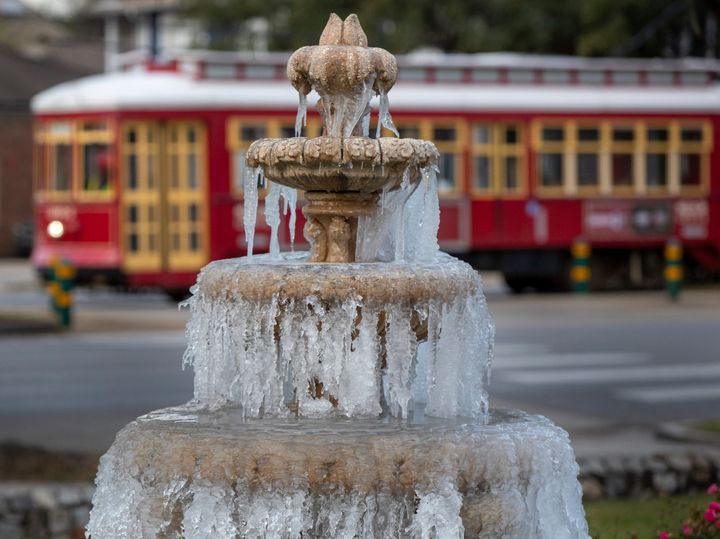 The fountain is frozen as temperatures hovered in the mid 20s at Jacob Schoen & Son Funeral Home in New Orleans on Saturday.