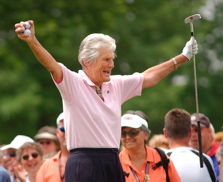 FILE - Kathy Whitworth responds to the crowd as she prepares to tee off during the Tournament of Champions golf tournament at Locust Hill Country Club in Pittsford, New York on June 20, 2006.