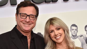 Actor Bob Saget and his wife journalist Kelly Rizzo arrive for the Showtime series "Shameless" FYC red carpet event at the Linwood Dunn theatre in Hollywood on March 6, 2019. (Photo by Chris DELMAS / AFP) (Photo by CHRIS DELMAS/AFP via Getty Images)