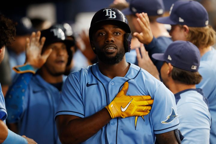 Tampa Bay Rays' Randy Arozarena reacts in the dugout after hitting a three-run home against the Toronto Blue Jays during the fifth inning of a baseball game Sept. 23, 2022, in St. Petersburg, Fla. In a decision announced Saturday, Dec. 24, 2022, the United States will permit Major League Baseball players from Cuba to represent their home country in the World Baseball Classic next year.