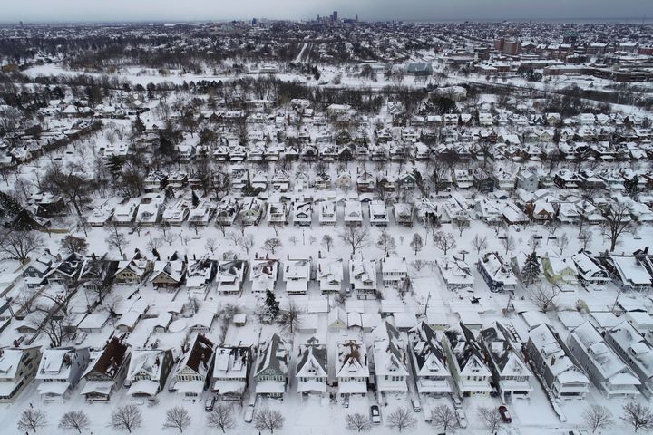 An aerial view of the 1901 Pan-American Exposition neighborhood in Buffalo, N.Y., which remains coated in a blanket of snow after a blizzard, Tuesday, Dec. 27, 2022. State and military police were sent Tuesday to keep people off Buffalo’s snow-choked roads, and officials kept counting fatalities three days after western New York’s deadliest storm in at least two generations. (Derek Gee/The Buffalo News via AP)