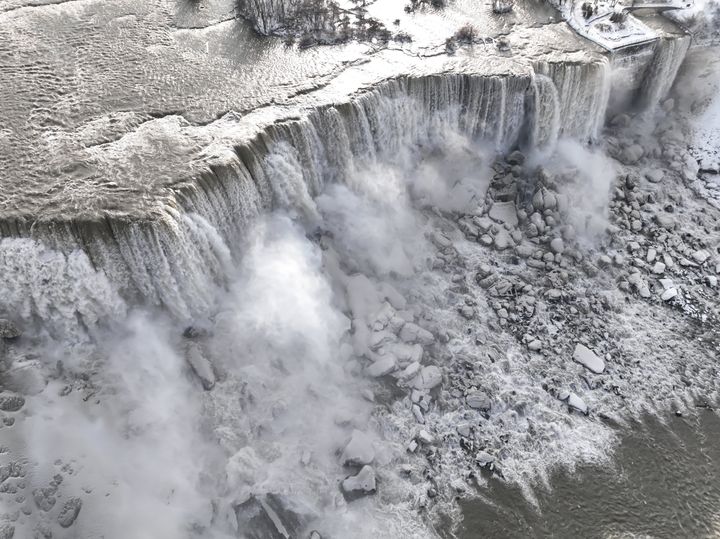 : An aerial view of the partially frozen Niagara Falls, which is on the border with Canada, on December 27, 2022