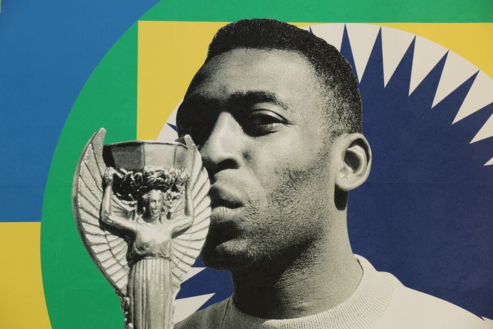 A mural depicting FIFA Legend Pelé lifting the Rimet cup is seen during a tribute event to him in Qatar earlier this month. 