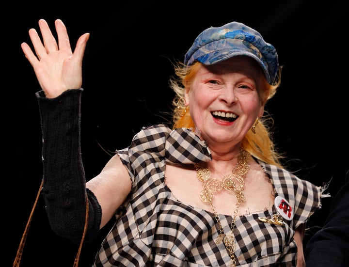 FILE - British fashion designer Vivienne Westwood waves to the audience after presenting the Vivienne Westwood fashion collection from the men's Spring/Summer 2013 collection, part of the Milan Fashion Week, unveiled in Milan, June 24, 2012. Westwood, an influential fashion maverick who played a key role in the punk movement, died Thursday, Dec. 29, 2022, at 81. (AP Photo/Luca Bruno, File)