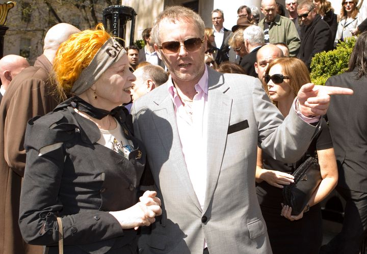 British fashion designer Vivienne Westwood, left, attends the funeral service for British music impresario Malcolm McLaren with their son Joe Corre at a church in London Thursday April 22, 2010. McLaren died in Switzerland on April 8, 2010. (AP Photo/Nigel Askew)