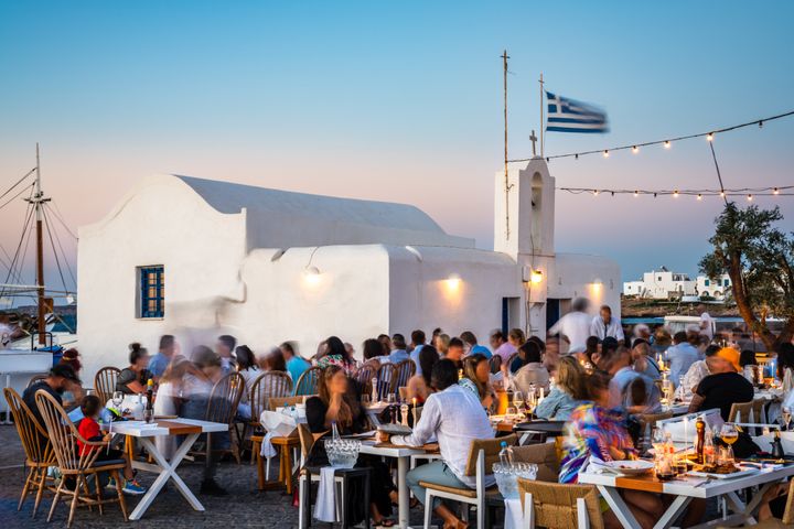 Dining out at Naousa harbour. Paros, Cyclades, Greece