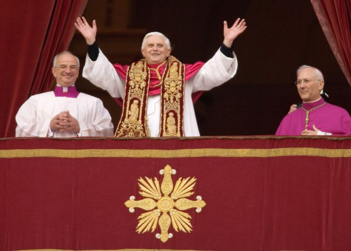 Pope Benedict XVI, Cardinal Joseph Ratzinger of Germany, waves from a balcony of St. Peter's Basilica in the Vatican after being elected by the conclave of cardinals April 19, 2005 in Vatican City.