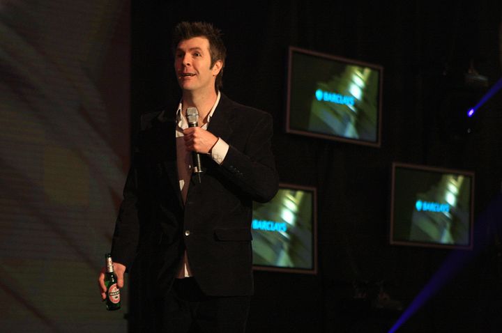 Rhod Gilbert on stage in 2009