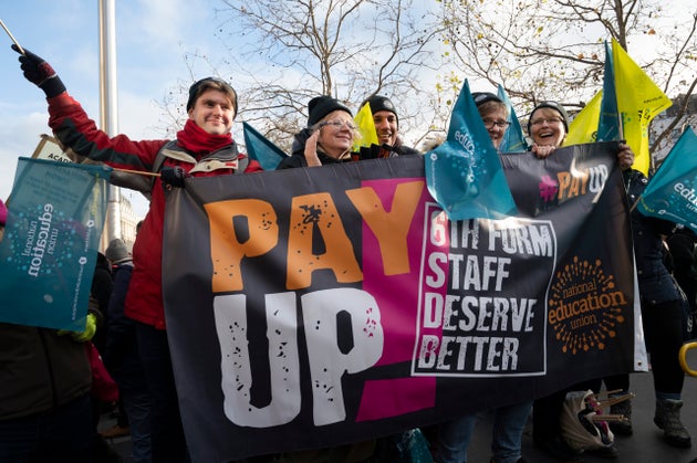 University and college staff strike in front of Kings Cross station over pay and pension on November 30 2022 in London, United Kingdom. 
