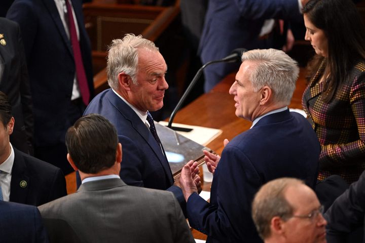 Rep.-elect Ryan Zinke (R-Mont.), left, speaks with Rep. Kevin McCarthy (R-Calif.) as the U.S. House of Representatives convenes for the 118th Congress at the U.S. Capitol in Washington, D.C., Jan. 3.