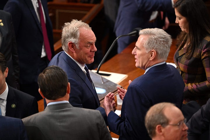 Rep.-elect Ryan Zinke (R-Mont.), left, speaks with Rep. Kevin McCarthy (R-Calif.) as the U.S. House of Representatives convenes for the 118th Congress at the U.S. Capitol in Washington, D.C., Jan. 3.