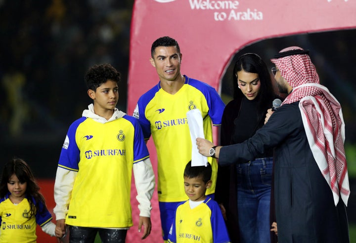 Soccer Football - Al Nassr unveil new signing Cristiano Ronaldo - Mrsool Park, Riyadh, Saudi Arabia - January 3, 2023 New Al Nassr signing Cristiano Ronaldo with his partner Georgina Rodriguez and family during his presentation REUTERS/Ahmed Yosri