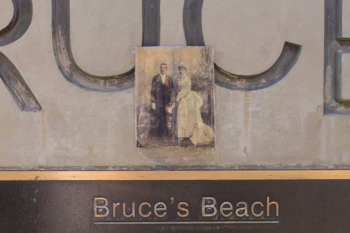 A photo of Willa and Charles Bruce is seen on a plaque at Bruce's Beach in Manhattan Beach, California in 2021.